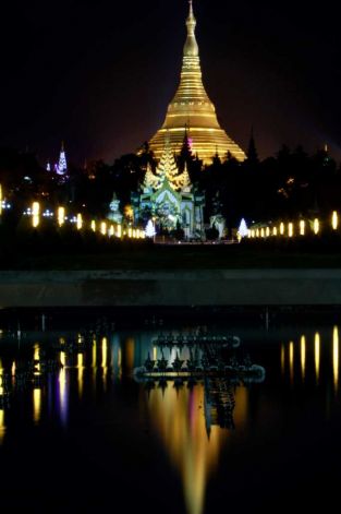 Description: Myanmar's land mark Shwedagon Pagoda is lit up during a preparation for 2,600 anniversary of its establishment, in Yangon, Myanmar Tuesday, Feb. 21, 2012. Vast crowds were gathering Wednesday at Myanmar's most sacred Buddhist shrine to celebrate a festival banned for more than 20 years under the former military government. Photo: Khin Maung Win / AP