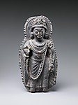 Description: Standing Bodhisattva with Radiate Halo and Mandorla