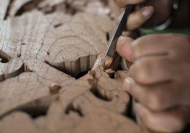 In 1997, having fled Tibet, Sampa Lhundup began a six-year apprenticeship in woodcarving.(Photo: Matt Wittmeyer) 