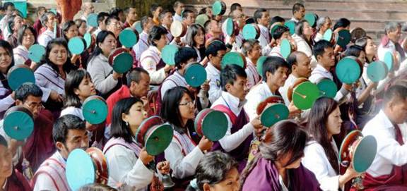 Devotees pray for world peace at the Mahabodhi Temple in Bodh Gaya on Saturday.- Photo: PTI