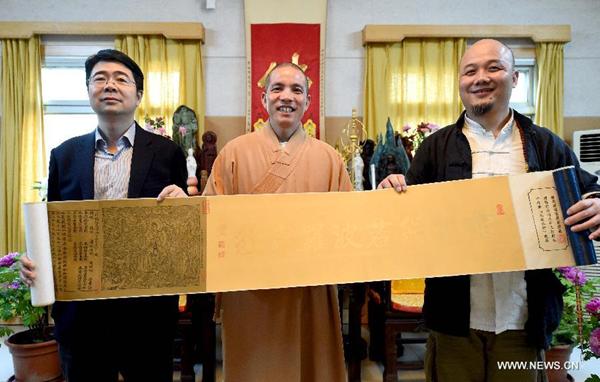 Wei on Friday presented woodblock copies of Diamond Sutra and Journey to the West as gifts to Baima Temple or White Horse Temple, which is the first Buddhist temple in China and considered 'the cradle of Chinese Buddhism' by most believers.