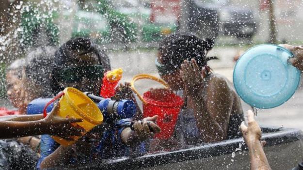 Buddhist New Year celebrations have begun in a number of nations across South East Asia, with lively water-throwing festivities.