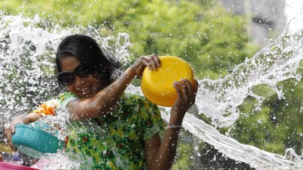 Thailand celebrates Buddhist festival with a splash