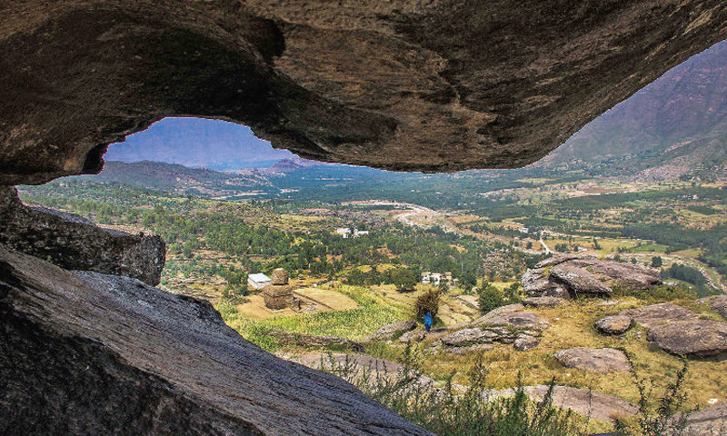 A view of the Balokaley vihara from a cave at Kandak valley in Barikot, Swat. &mdash; Dawn photo