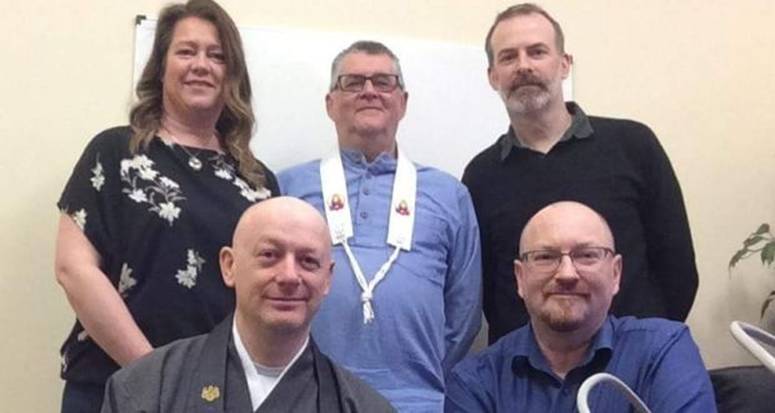 Front, from left, IBU president Rev Myozan Kodo Kilroy of Zen Buddhism Ireland, IBU secretary Kieron Lawlor. Back, from left, IBU treasurer Alison Lopez, of Kagyu Samye Dzong Dublin, IBU trustee Maitrikaya of the Dublin Buddhist Centre, and IBU trustee Robert Hensey of the Jampa Ling Tibetan Buddhist Centre.