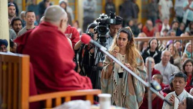 An audience member asks a question during Mondays meeting. Photo by Tenzin Choejor. From dalailama.com