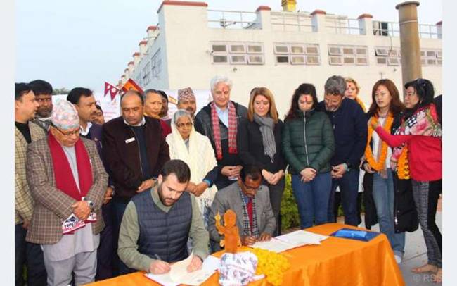 Description: The mayors of Cceres and Lumbini sign a memorandum of understanding twinning the two towns. From khabarhub.com