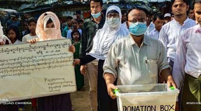 Description: Rohingya refugees in Cox's Bazar, Bangladesh, raising funds for Buddhists displaced by fighting in Rakhine State. From rfa.org