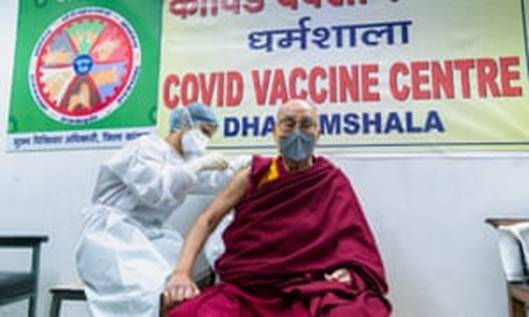 The Dalai Lama receiving the vaccine at Zonal hospital.