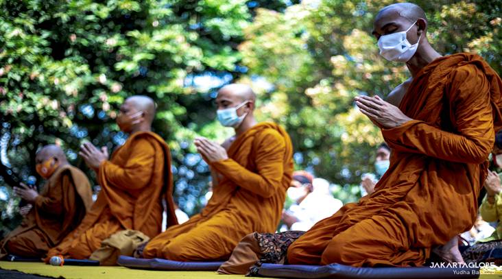 Buddhist monks pray during Vesak celebration at the Borobudur Temple in Central Java, on May 26, 2021. (JG Photo/Yudha Baskoro)