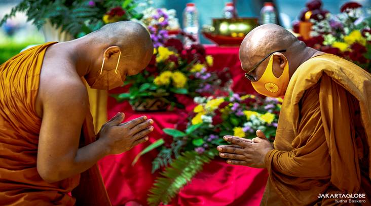 Buddhist monks pray during Vesak celebration at the Borobudur Temple in Central Java, on May 26, 2021. (JG Photo/Yudha Baskoro)